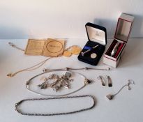 A selection of silver jewellery to include a charm bracelet, Pandora bracelet, etched bangle, rope-t