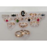 An assortment of fourteen 9ct yellow gold gem-set rings, all hallmarked, 36g (14)