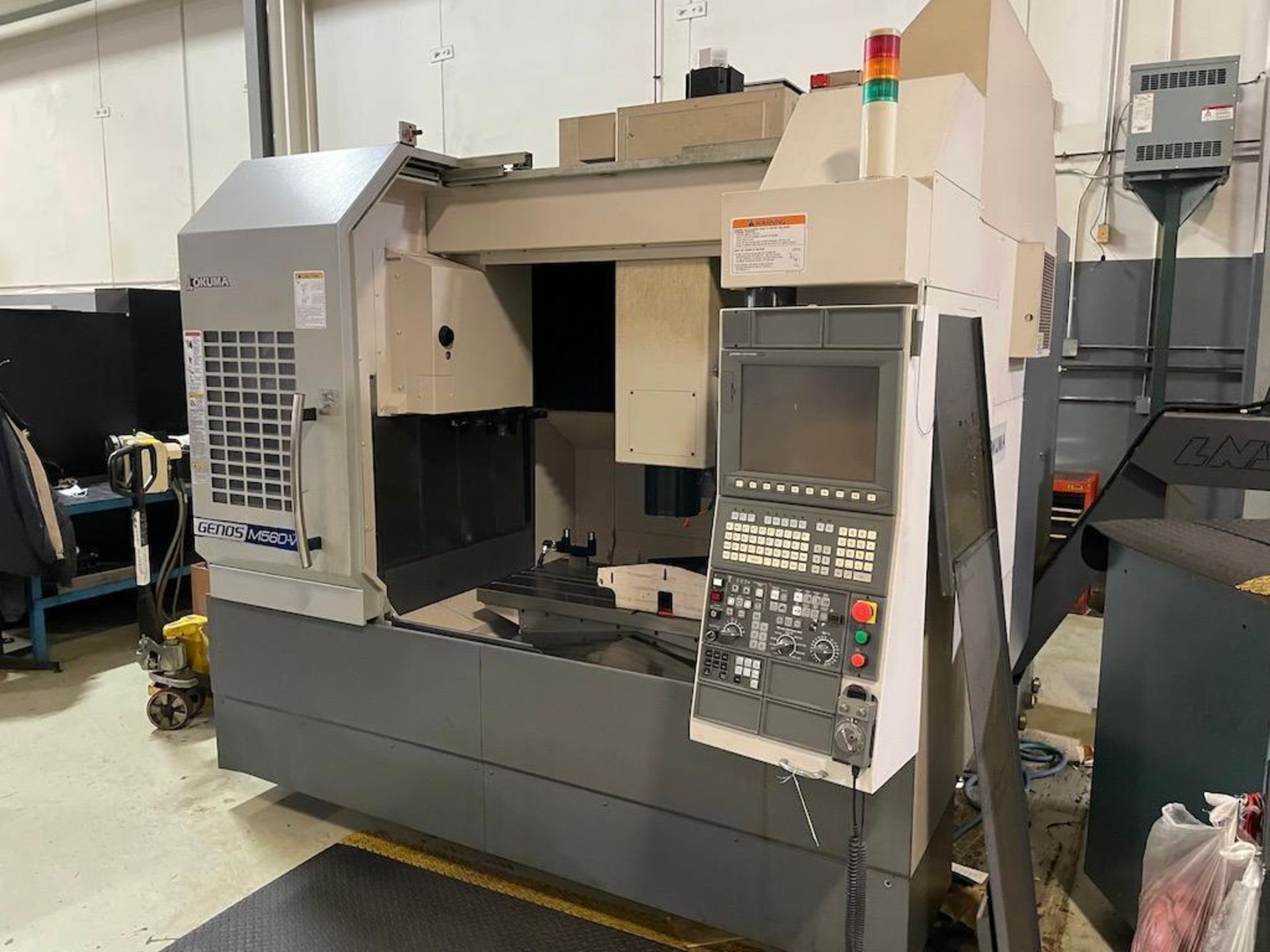 2012 OKUMA CNC VERTICAL MACHINING CENTER, MODEL M560-V, 51 INCH X 22 INCH TABLE, CAT 40, LASER