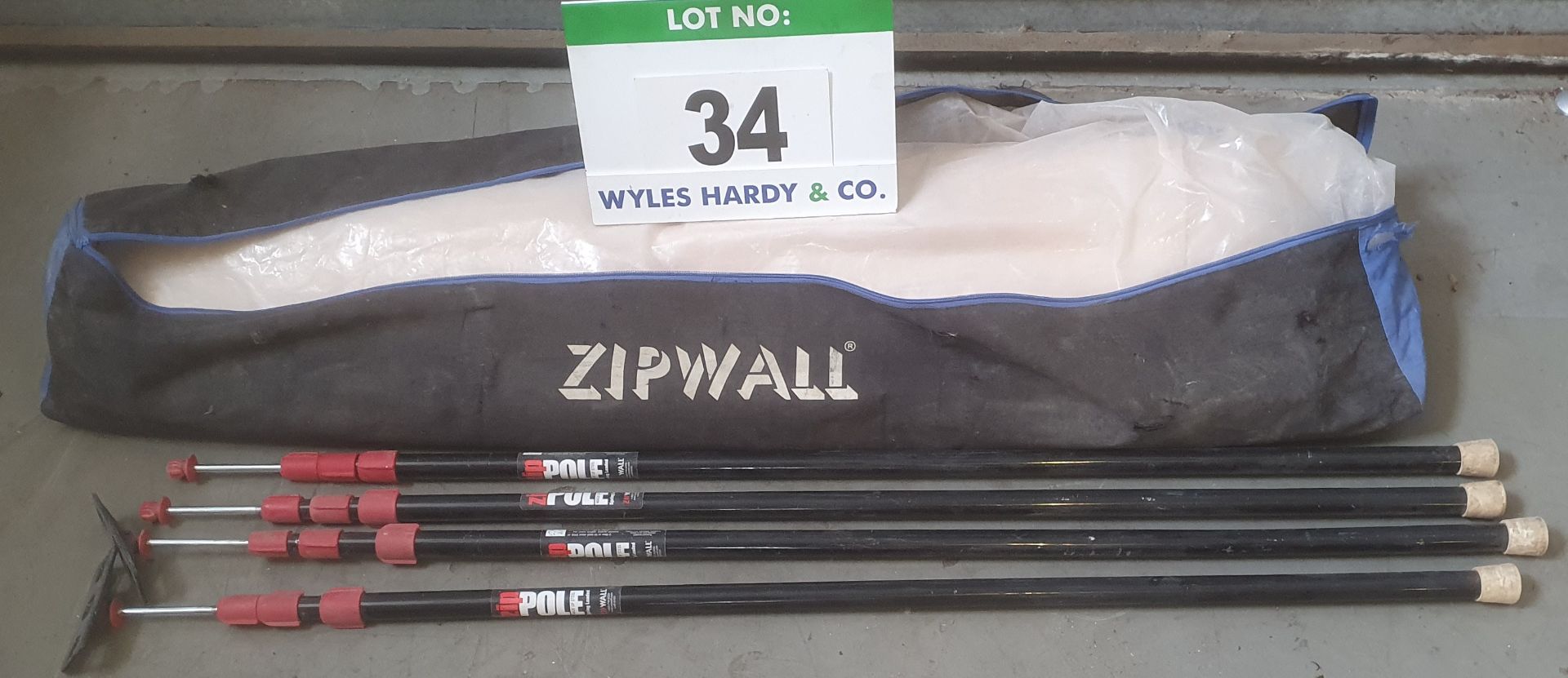 A ZIPWALL 3M Portable Dust Barrier in a Fabric Storage and Transportation Bag