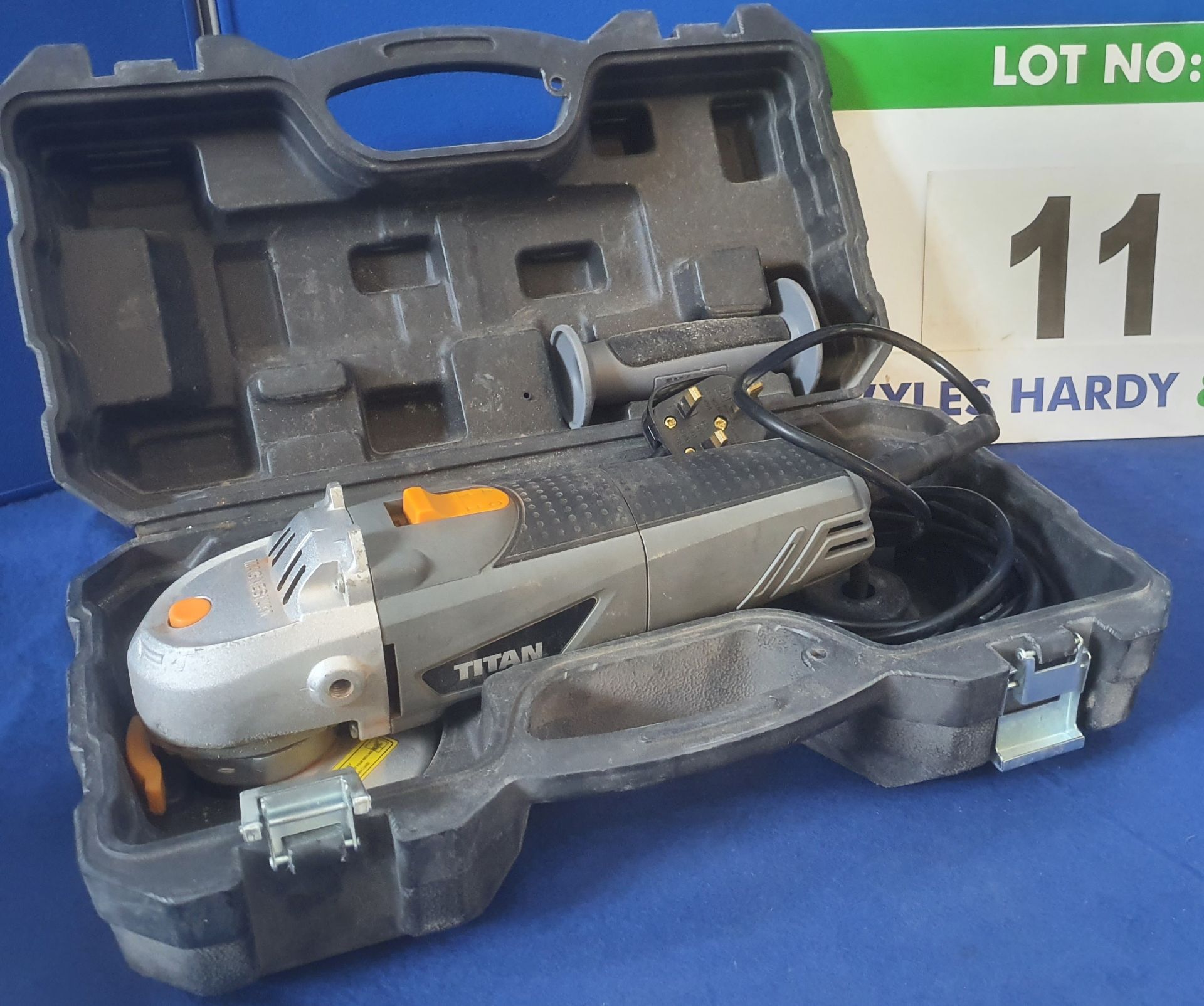 A TITAN TTB 281 GRD 115mm Angle Grinder in Rigid Plastic Storage and Transportation Case (Note: No