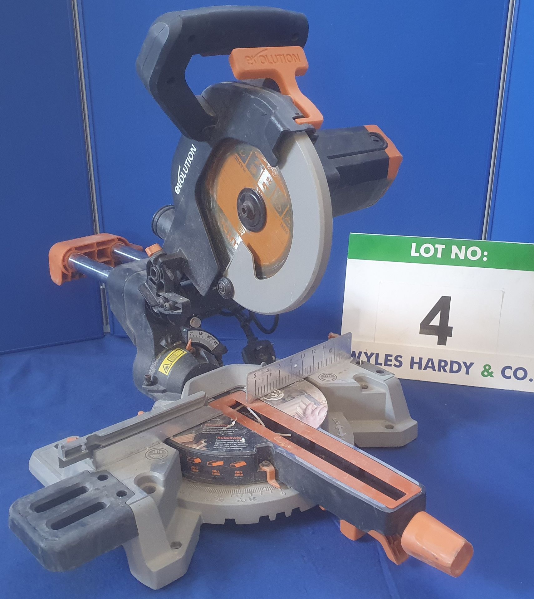 An EVOLUTION R210 240V AC, 210mm Circular Chop Action and Pull-Over Compound Mitre Saw