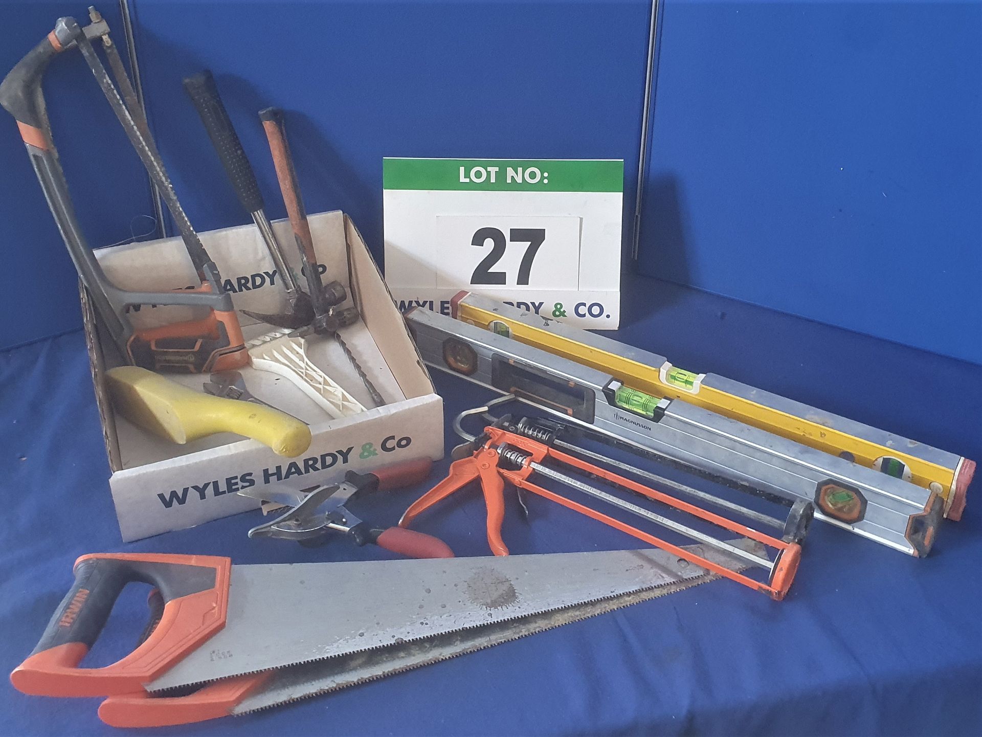 A Box of Hand Tools including STABILA 61cm Spirit Level, Two Hacksaws, A Urethane Mallet, Tube and