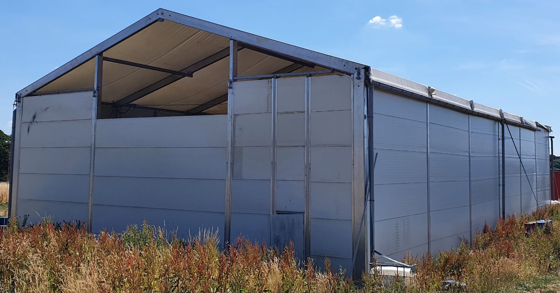 An Aluminium Framed Commercial Demountable Marquee with Profiled Alloy Sectional Wall Panels and