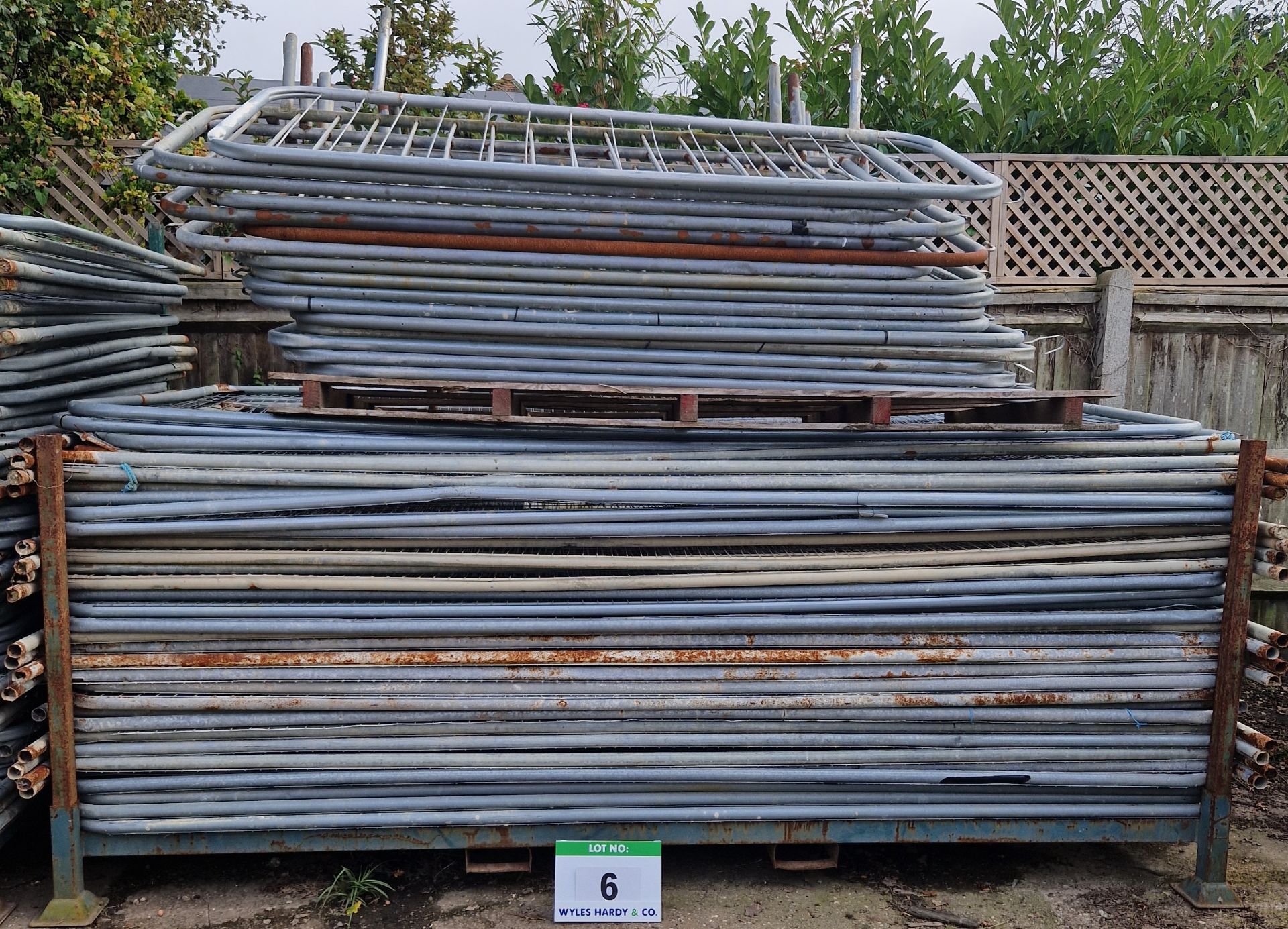 Thirty HERAS Temporary Fencing Panels with Foot Blocks and Sixteen Free Standing Barrier Panels