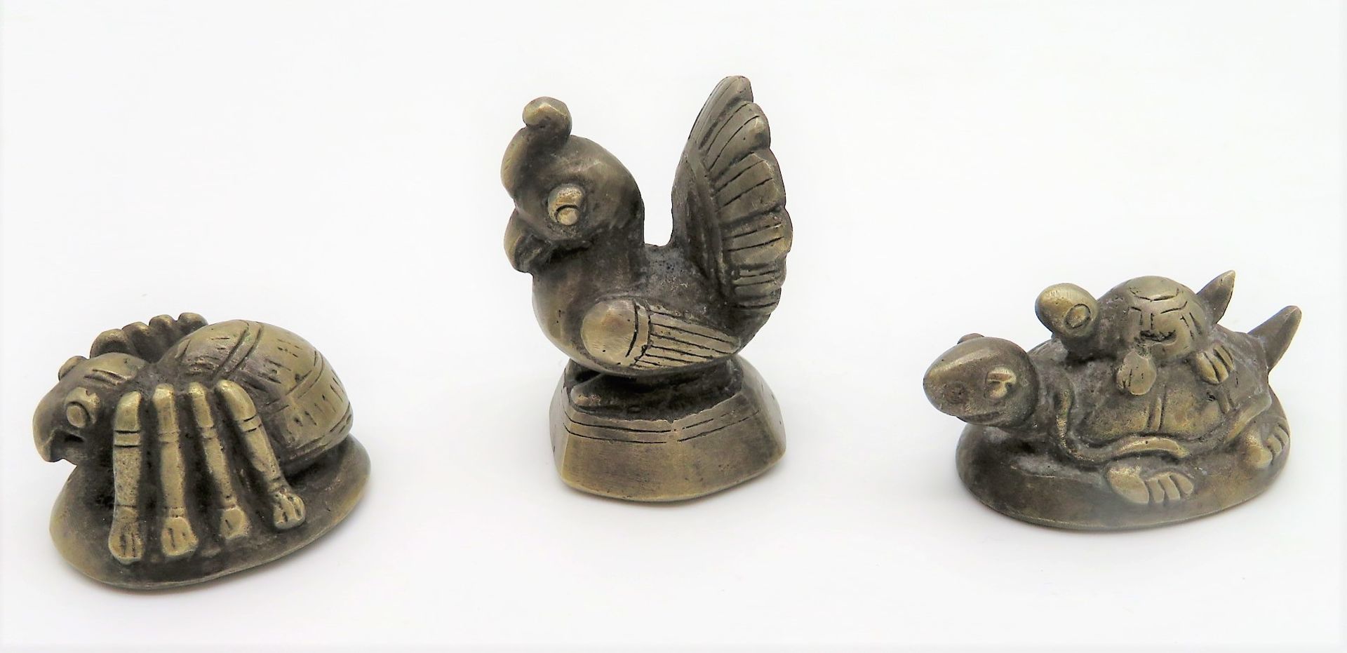 3 Opiumgewichte, Burma, Bronze, ca. h 4,5 cm.