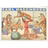 [Animal Dressage] Circus Hagenbeck. Tiger jumping through hoop held by tamer. Friedländer, 1923