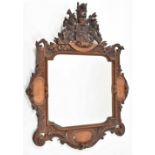 Mirror in ornamental carved oak frame