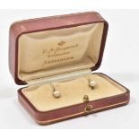 Pair of gold pearl earings