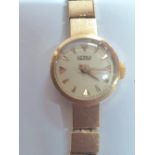 Ladies Ultra 9ct gold watch case on a 9ct block-link yellow gold strap, 13.3 grams gross
