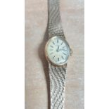 Ladies vintage Tissot cocktail watch with 9ct case and strap, 18 grams gross