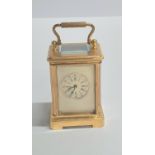 Vintage French miniature carriage clock with porcelain panels and bevelled glass complete with