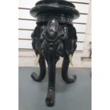 Late Victorian, ebonised wooden carved planter stand in the form of 3 Elephant heads and trunks,