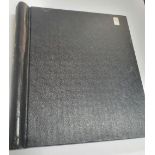 Black Tower stamp album containing a good collection of GB unmountred mint and unmounted used