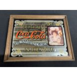 Small Coca-Cola framed advertising mirror