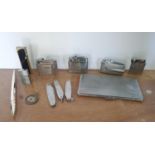 Heavy silver coloured pen with unidentified stamps together with a white metal cigarette case,