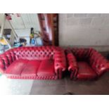 Chesterfield, Oxblood leather three-seater sofa and armchair, a/f, (2)