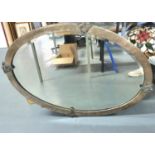 Large, early 20thC oval bevel edged mirror with distressed metal frame