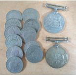 WWII British war and defence medals together with 11 20thC 2 shilling coins