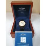 Gents Rotary 34mm, 18ct yellow gold case with champagne baton dial and original black leather strap,
