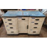 Vintage wooden workbench/desk with drawers either side and a central cupboard and contents