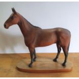 Beswick "Arkle" on wooden plinth, 29cm long