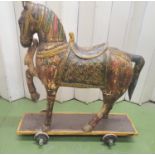 Antique hand painted large childs ride-on horse on 4 wheels, Approx 89cm long by 100cm tall