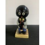 Carlton Ware 'Golly playing Oboe' , marked COLOUR TRIAL 20cm tall