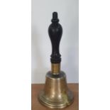 Old brass school bell with ebonised wood handle