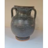 A black glazed pottery Pelike vase, southern Italy, 4th or 5thC. 15cm tall Provenance - Purchased