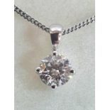 18ct white gold necklace and pendent, the pendent containing a 0.52ct brilliant, round cut Candour