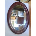 Oval 20thC inlaid wood mirror