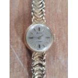 Ladies Accurist 21 jewel cocktail watch with 9ct yellow gold case and strap, 18.8 grams gross