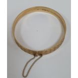 Solid 9ct gold etched bangle, 14.4 grams