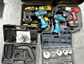 Collection of power tools including drills