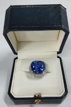 18k White Gold Heat Treated Sri Lankan Sapphire & Diamond Cluster Ring. The ring was crafted by