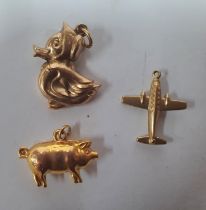 Three 9ct yellow gold charms (3), 2.4 grams