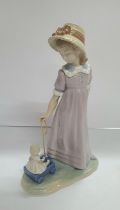 Lladro "Pulling dolls carriage" #5044, designed by V Martinez, 1980, 11" tall