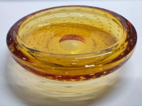 A retro amber controlled bubble orange bowl, possibly Whitefriars 20.5cm diameter