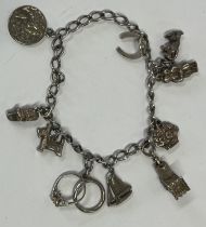 Silver Charm bracelet with 9 charms, (22.5g)