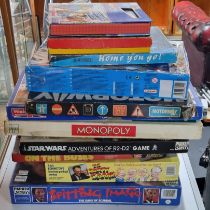 Collection of board games including Monopoly and On The Bus