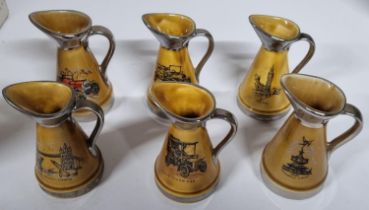 Three Wade Historic cars miniature oil jugs with three London oil jugs 1950s