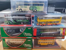 Collection of seven cased Corgi buses (7)