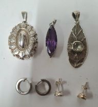 Three good quality silver pendants together with 2 pairs of modern silver earrings (5)