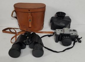 A Camera and a pair of Binoculars, both with cases (Qty)