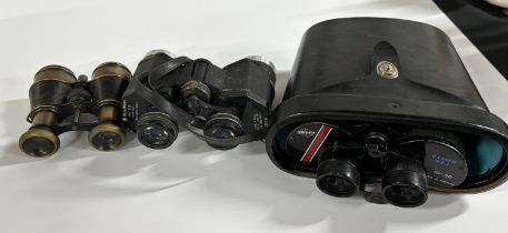 3 Pairs of binoculars, one Swift