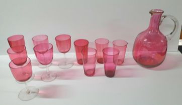 Victorian cranberry jug with 6 associated wine glasses and 5 tumblers (12)
