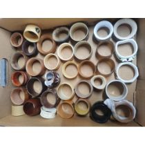 Two boxes containing a large quantity of old napkin rings mainly made from natural products such