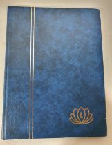 Blue stock book containing QEII Christmas Island unmounted mint an dused, sets and mint sheets