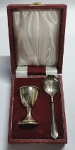 Silver cased egg cup and spoon 40 grams